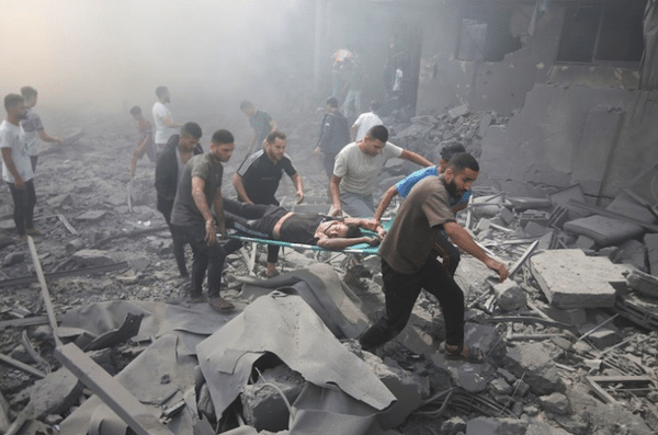 | Palestinians evacuate wounded after an Israeli airstrike in Rafah refugee camp Southern Gaza Strip October 122023 Photo APHatam Ali | MR Online